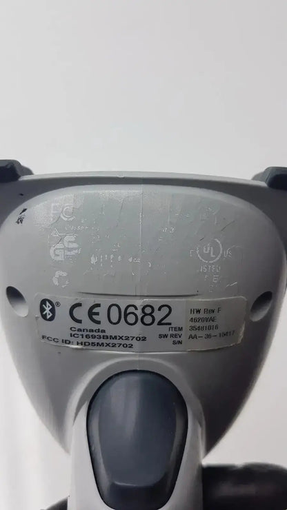 Gray adaptis handheld hd5mx2702 bluetooth bar code scanner with black trigger and certification labels visible on the back side