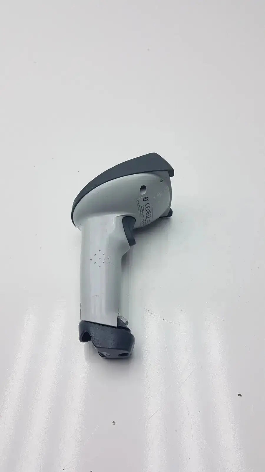 Gray and black adaptis handheld hd5mx2702 bluetooth bar code scanner with ergonomic grip for comfortable use