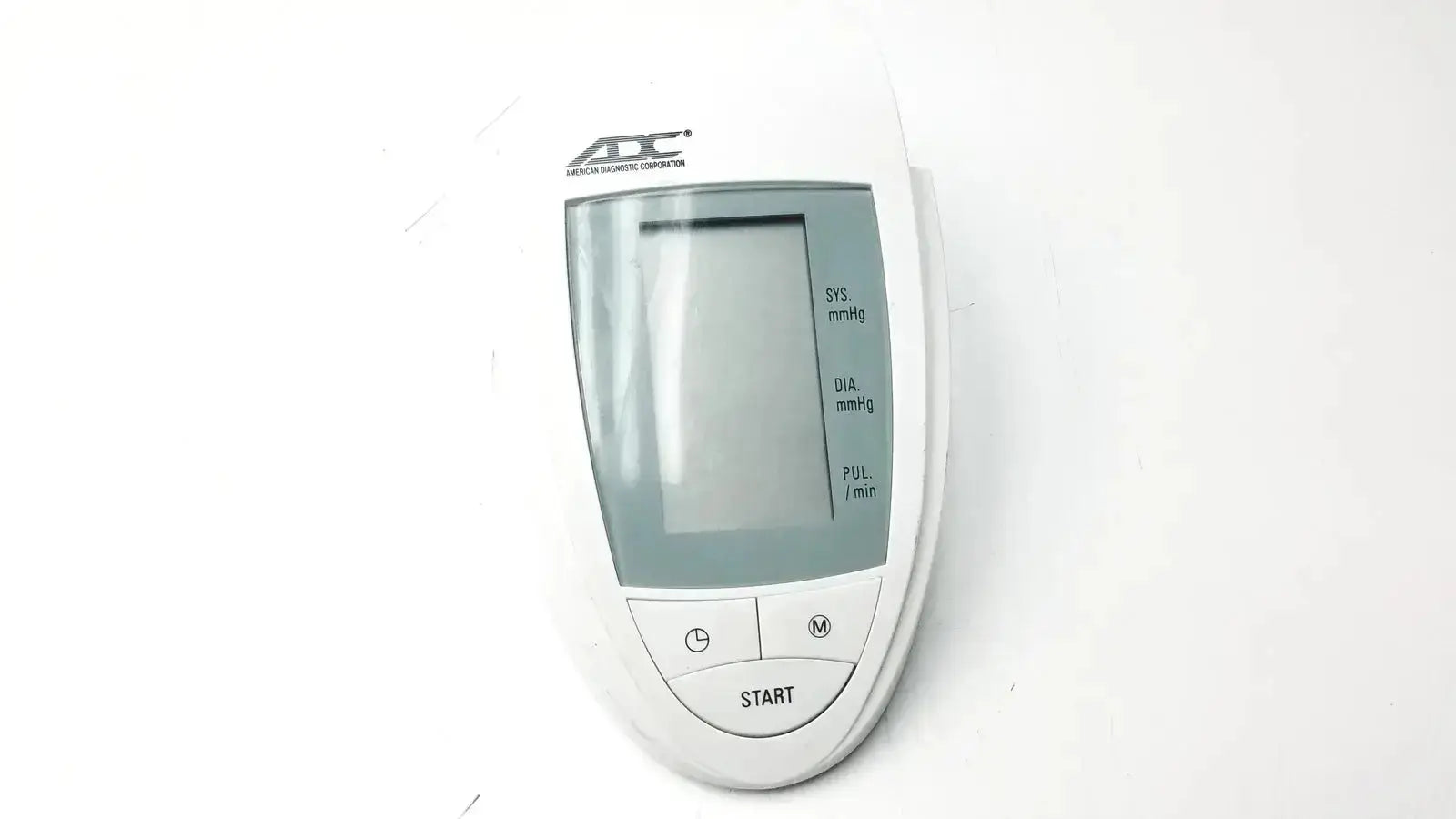 White plastic adc advantage 6013 series digital blood pressure monitor with gray display and labeled measurement indicators