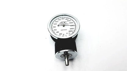 Silver and black aneroid sphygmomanometer manual gauge with chrome casing and rubber cuff for blood pressure monitoring