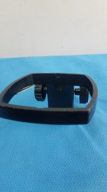 Adjustable flash gun bracket with black plastic tripod mount and adjustable clamps for reuse medical equipment