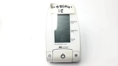 White plastic advantage digital bp monitor 6021 with a digital display and labeled measurement indicators by adc advantage
