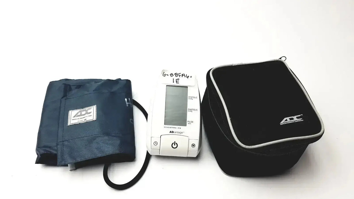 White digital bp monitor with navy blue cuff and black carrying case adc advantage advantage digital bp monitor 6021