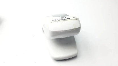 White plastic nail dryer with rounded compact design and small label on top shown with advantage digital bp monitor 6021
