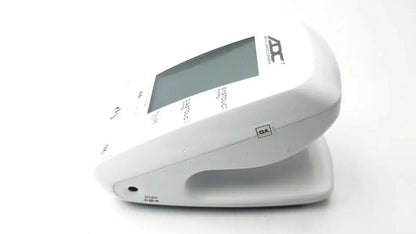 White plastic digital bp monitor adc advantage with rectangular screen and rounded edges used medical equipment for sale