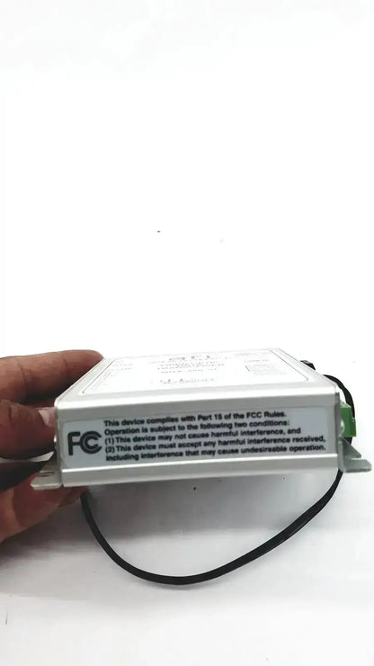 White rectangular electronic power supply unit with black cables and green terminal connector for american fibertek mrx-480-sl optic data transceiver