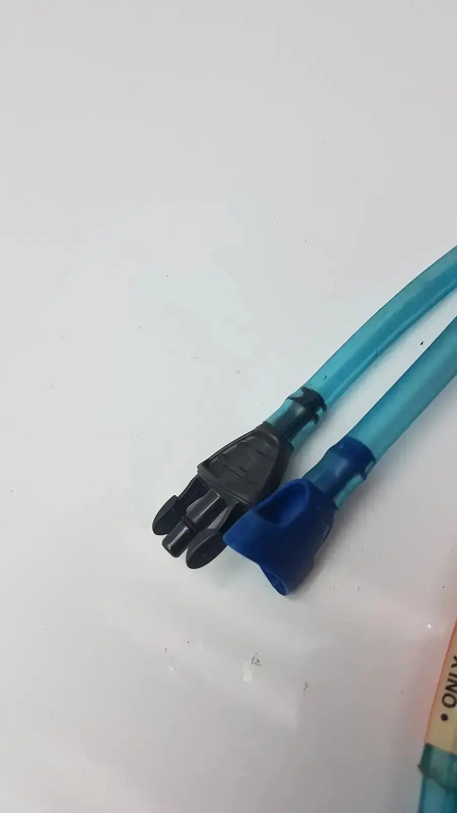 Blue and black hydration tube connectors for aiircast air comprressor air comprressor hose compression devices