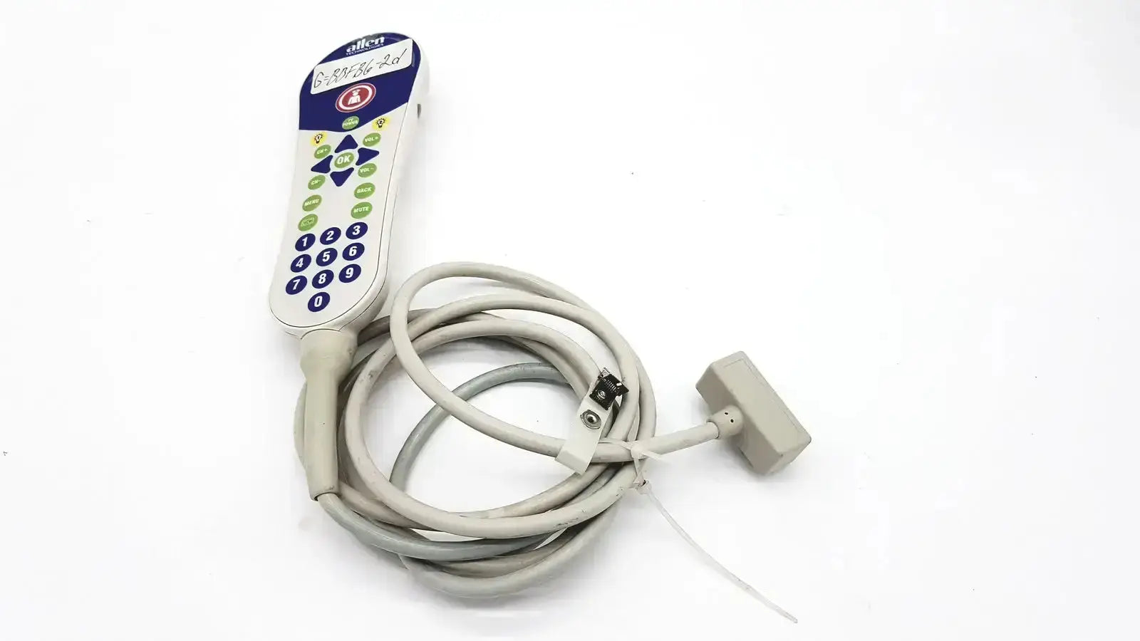 Gray coiled cable with white and blue olympus control panel remote featuring colored buttons for allen technologies curbell pillow speaker nurse call tv remote