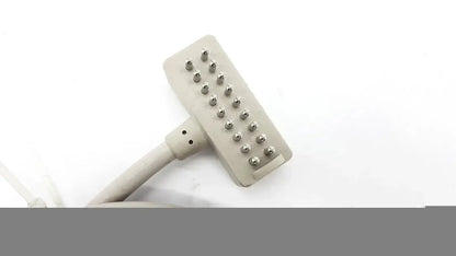 Gray plastic hair removal device with metallic pin grid for allen technologies curbell pillow speakers nurse call tv remote
