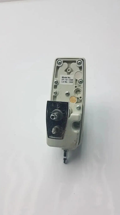 Gray plastic allied healthcare vacutron suction regulator with black control knob and silver screws for medical use