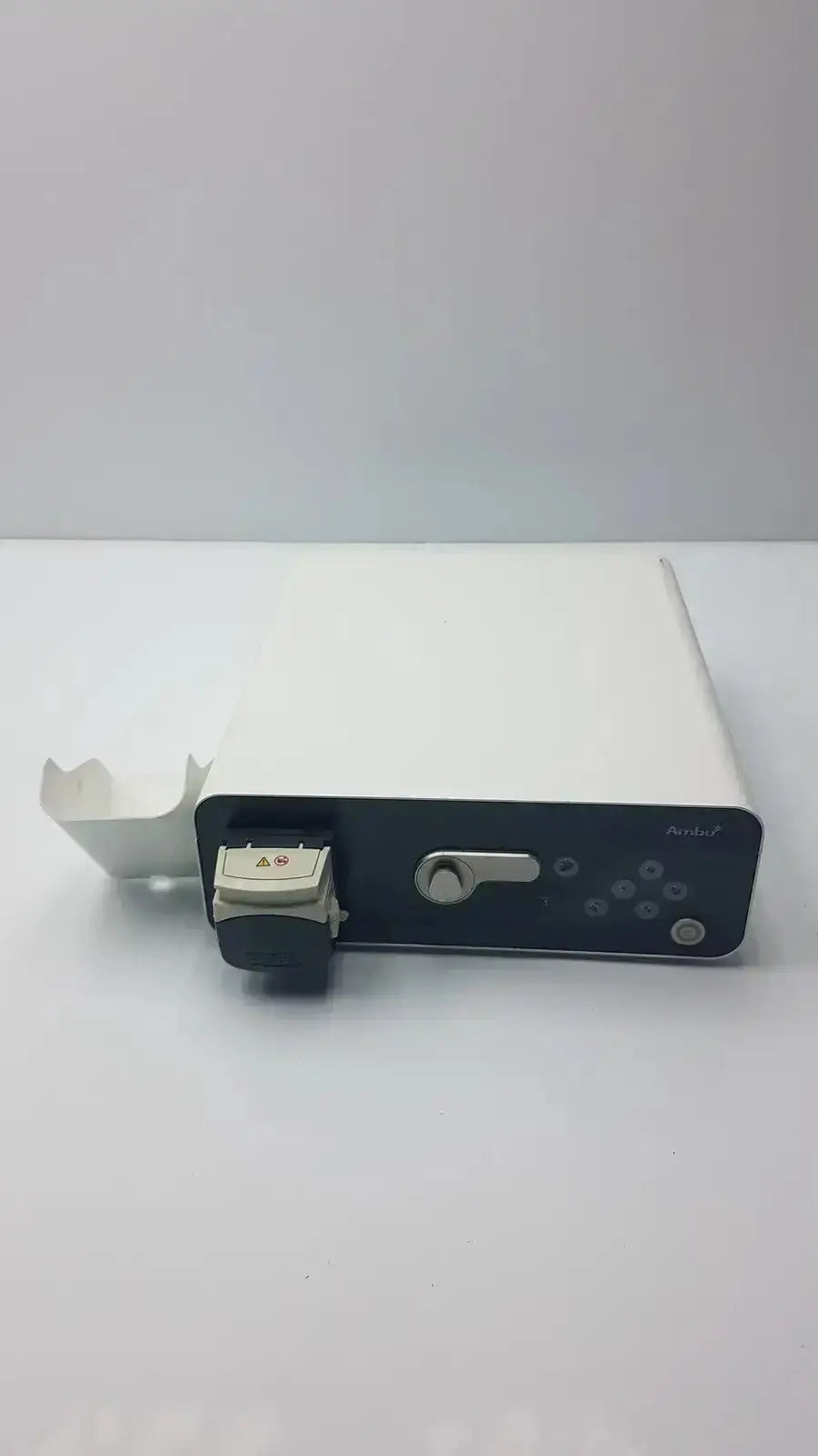 White and black ambu abox duodeno medical device with sleek rectangular design, control panel, and side compartment visible