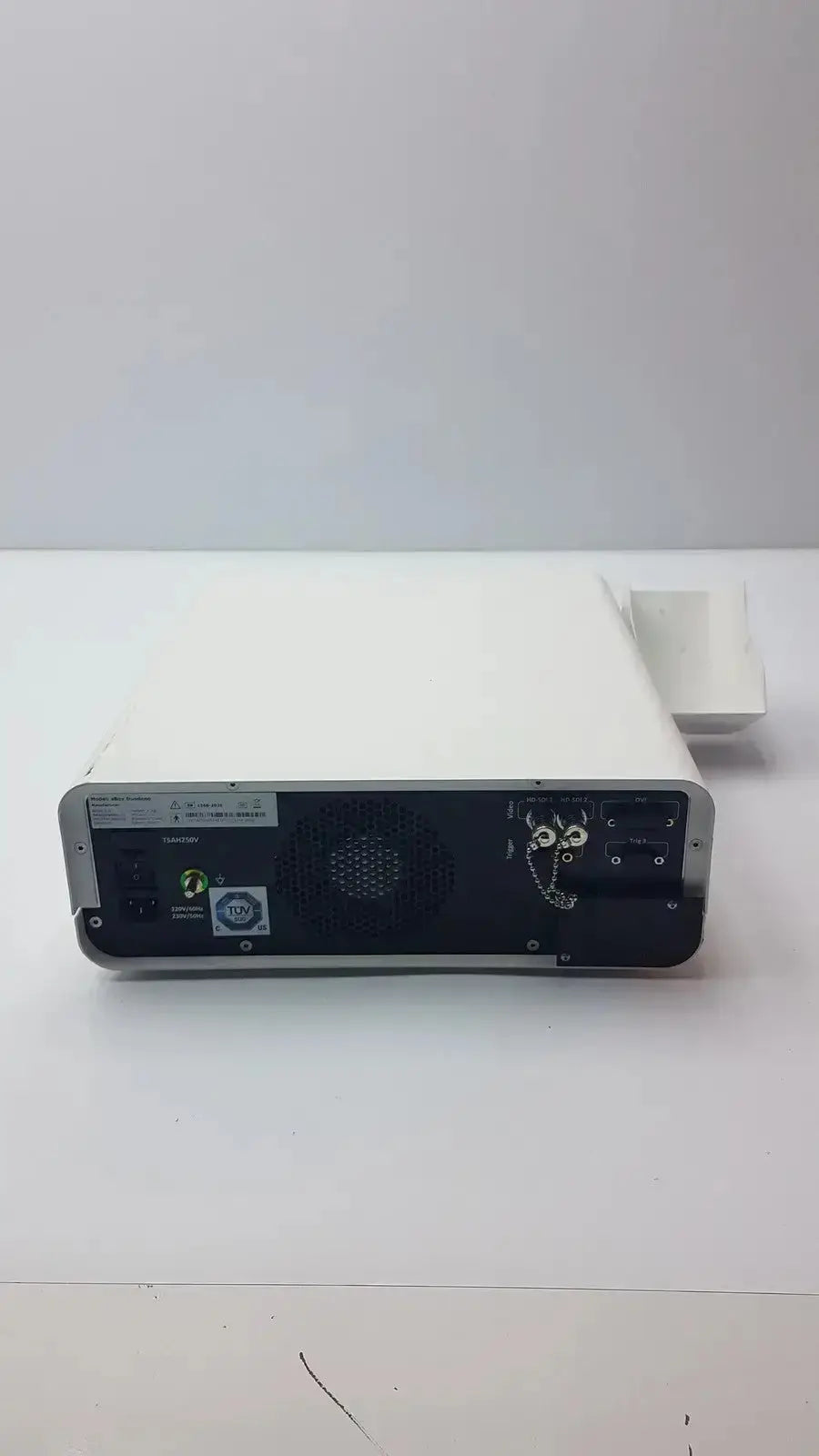 White rectangular ambu abox duodeno medical imaging device back with black panel ventilation grille ports and control buttons
