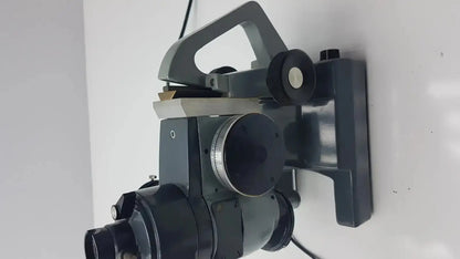 Black metal optical ao micro star microscope with adjustable arm and circular dial by american optical