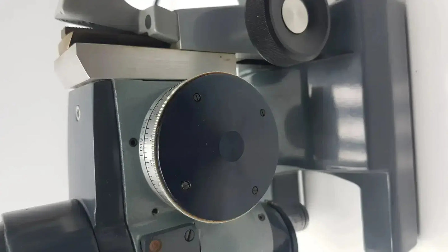 Gray metallic american optical optical ao micro micro star microscope k-2301 with circular dial and adjustment knobs