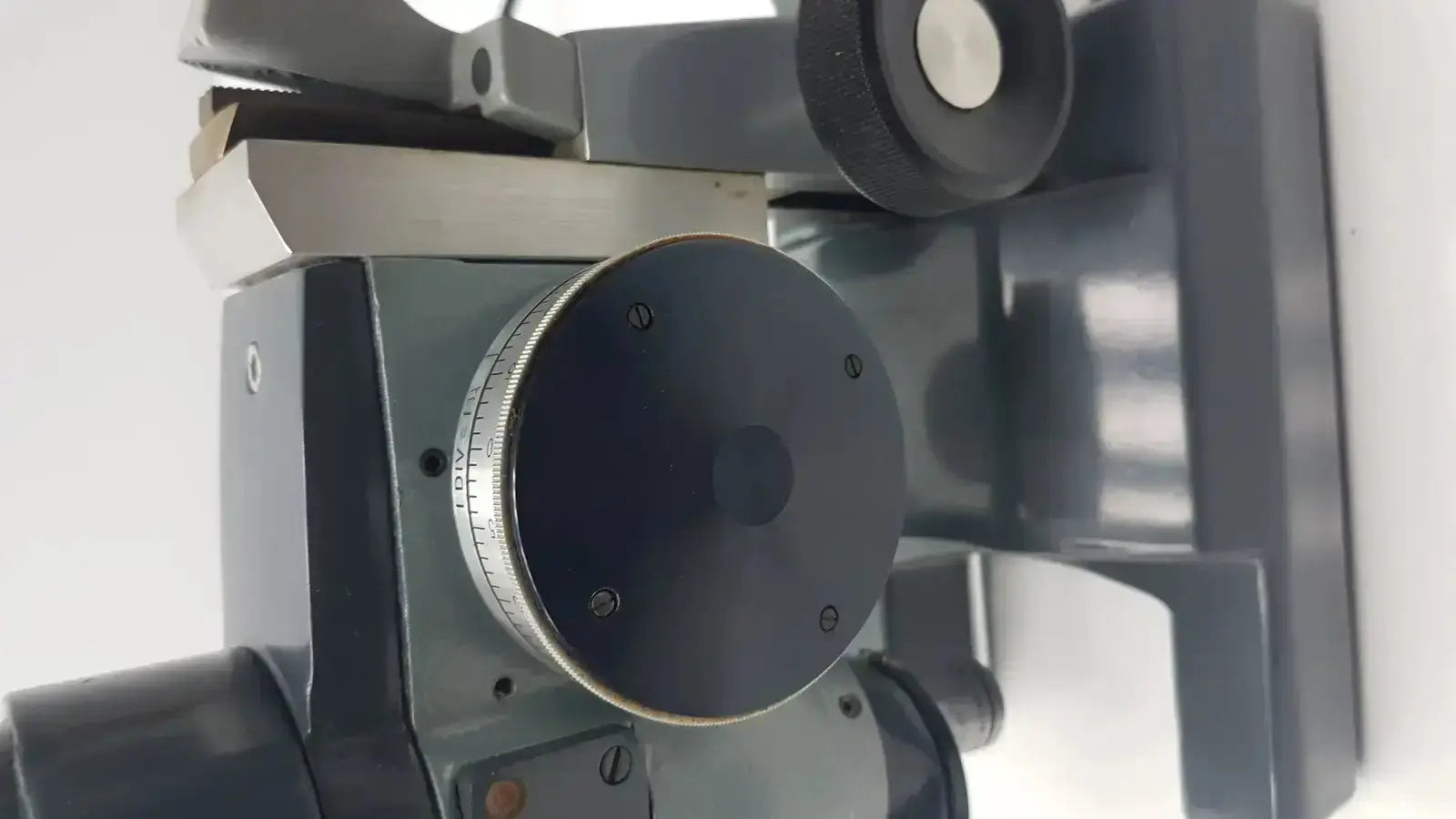 Gray metallic american optical optical ao micro micro star microscope k-2301 with circular dial and adjustment knobs