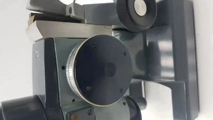 Gray metallic american optical optical ao micro micro star microscope k-2301 with circular dial and adjustment knobs