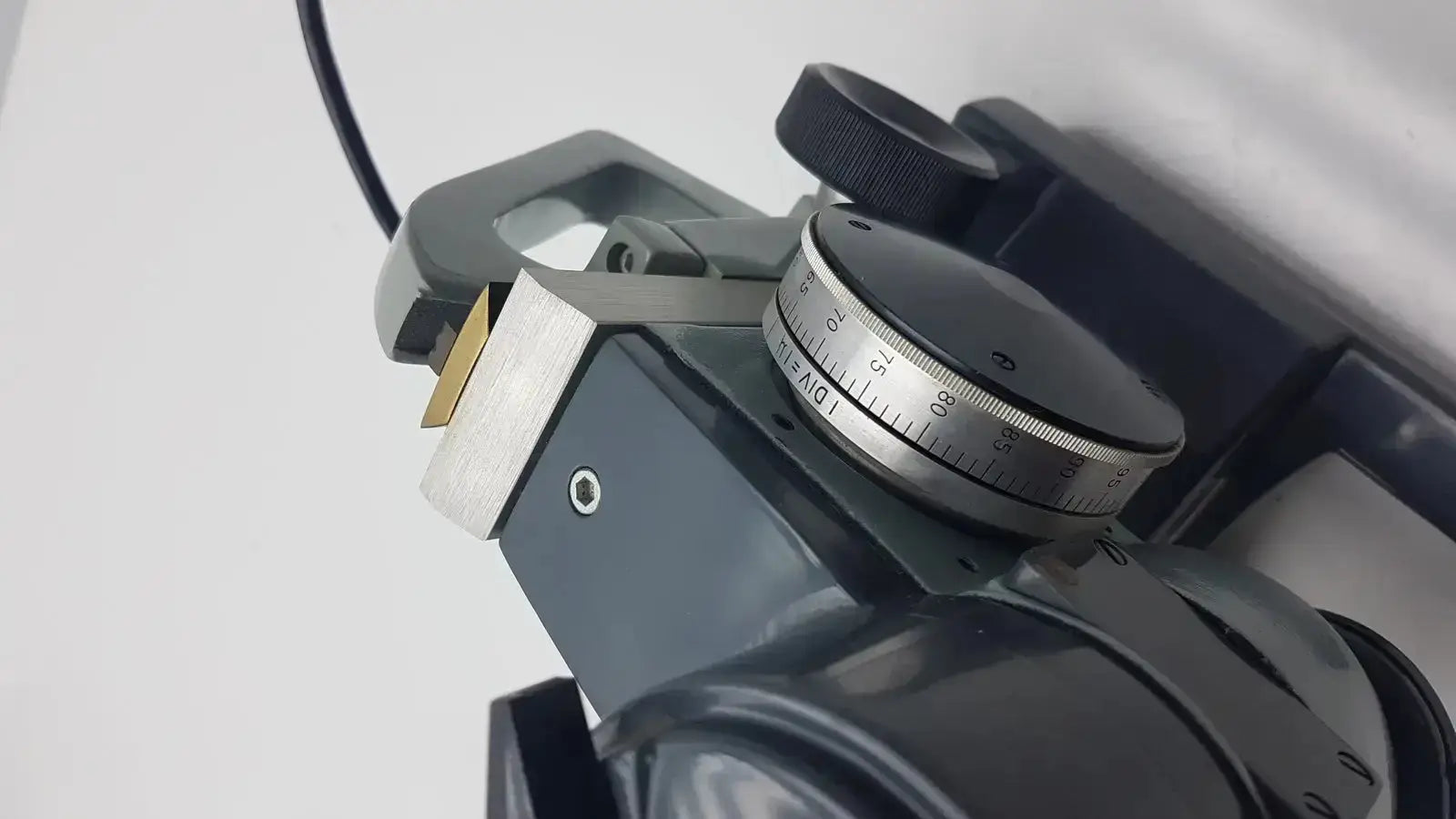 Black and silver precision measuring instrument with rotating degree dial from american optical ao micro star microscope k-2301