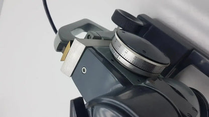 Black and silver precision measuring instrument with rotating degree dial from american optical ao micro star microscope k-2301