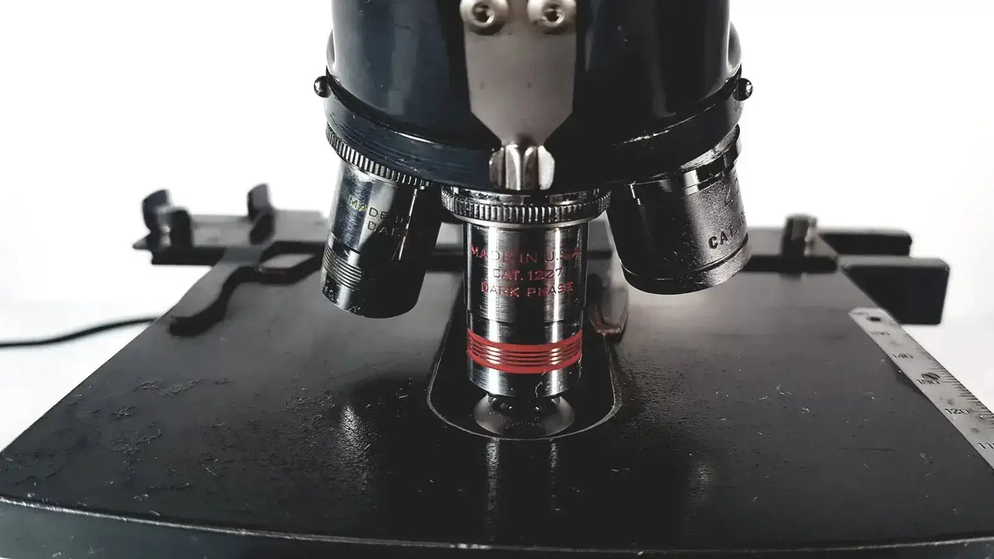 Black american optical spencer microscope with silver and red objective lens engraved made in japan