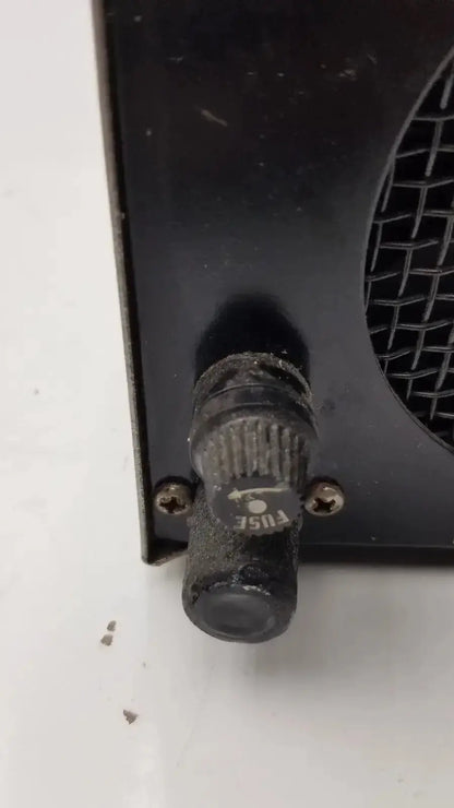 Black plastic fuse holder with textured grip and fuse label for amicon model lp-1 peristaltic pump system