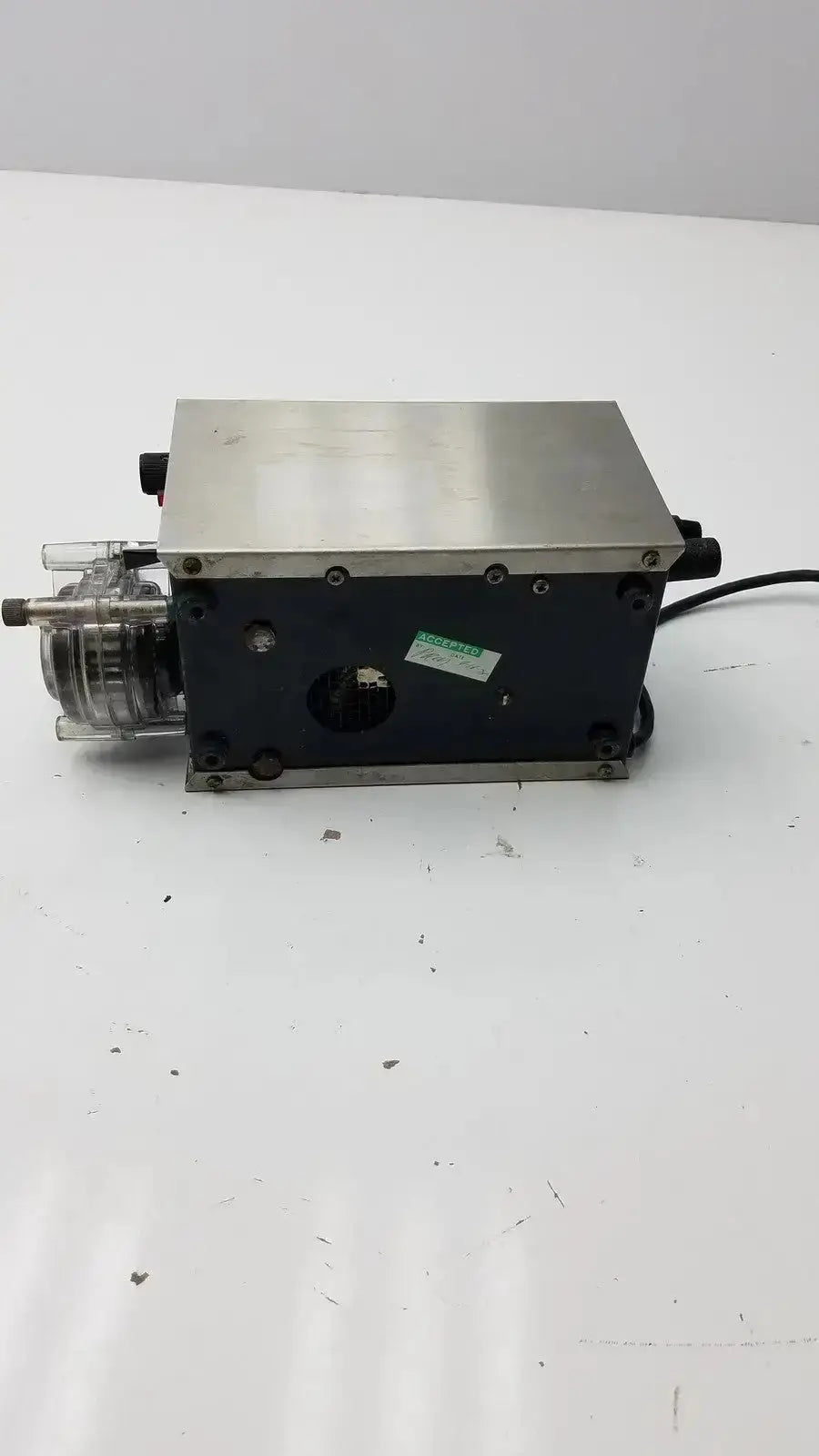 Industrial-grade stainless steel and black plastic lp-1 peristaltic pump with transparent cylindrical housing from amicon
