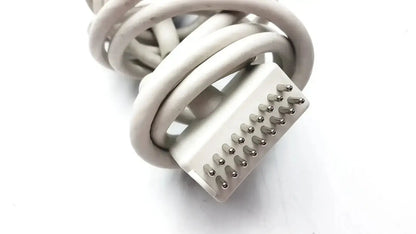 White coiled cable with rectangular multi-pin connector for the anacom medtek b0857-088dj nurse call unit back side
