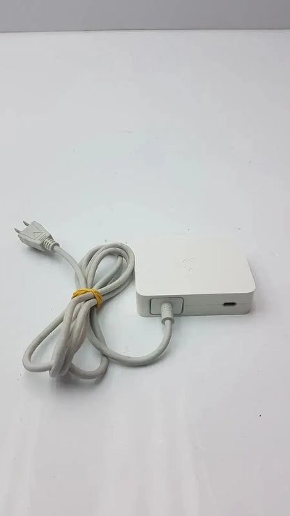 White rectangular 90w power adapter with coiled gray cable for apple cinema hd display model a1097
