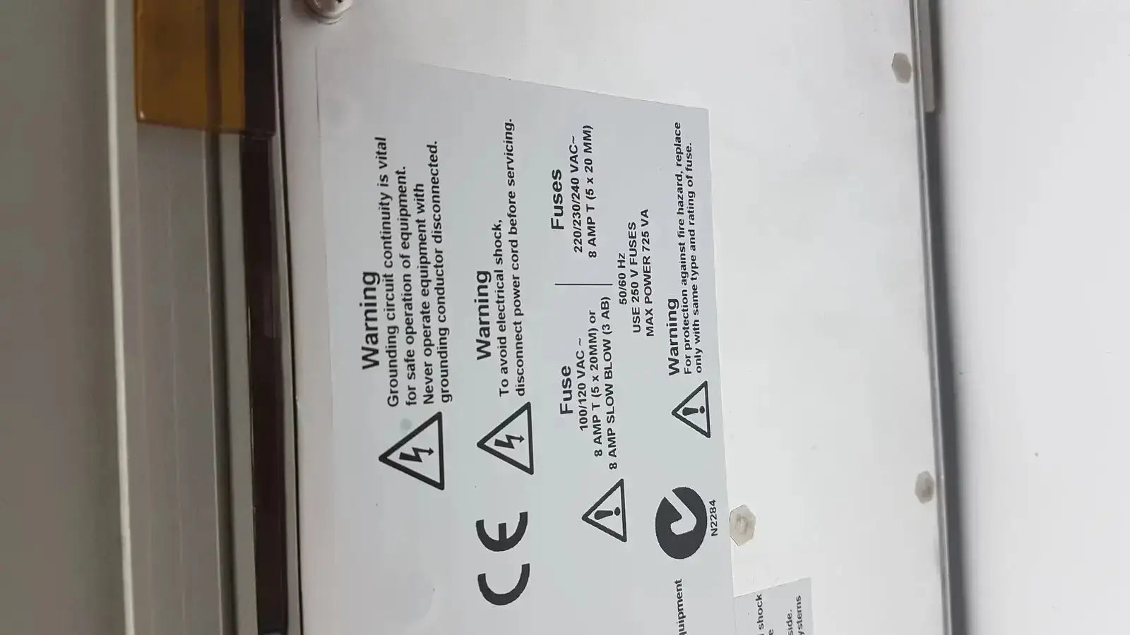 White label with black printed text and warnings on the back of applied biosystem geneamp pcr system 9700 thermal cycler