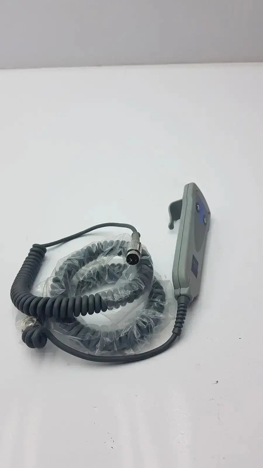 Gray arjo 2 button function handset with coiled black cable g-bbde2-30t used medical equipment for sale wrapped in plastic