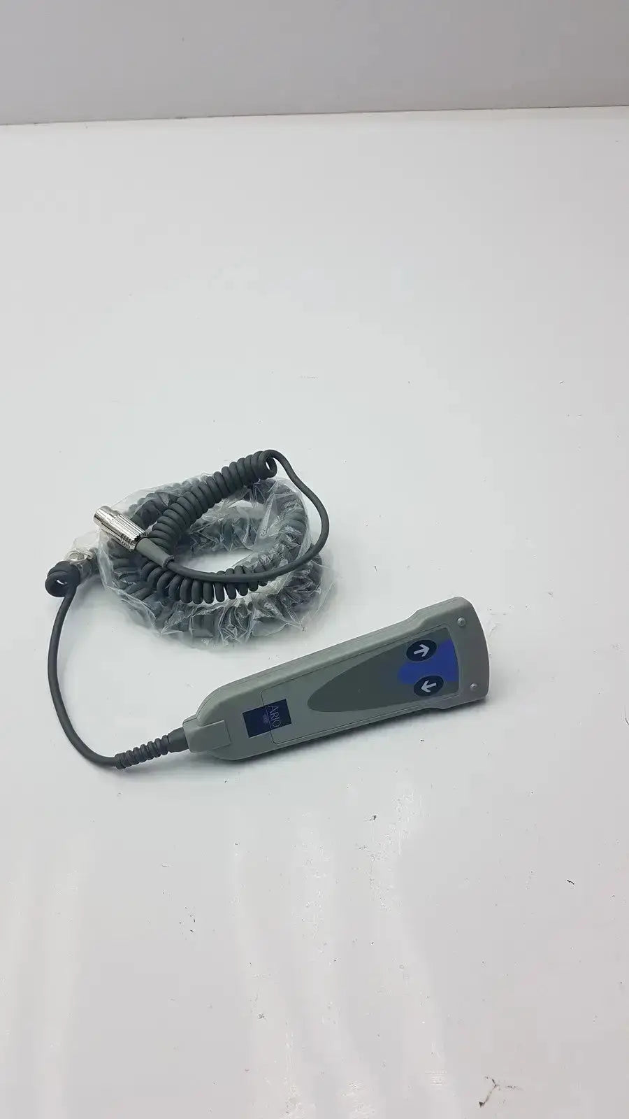 Gray arjo 2 button function handset with blue directional buttons and coiled black cable g-bbde2-30t used medical equipment for sale