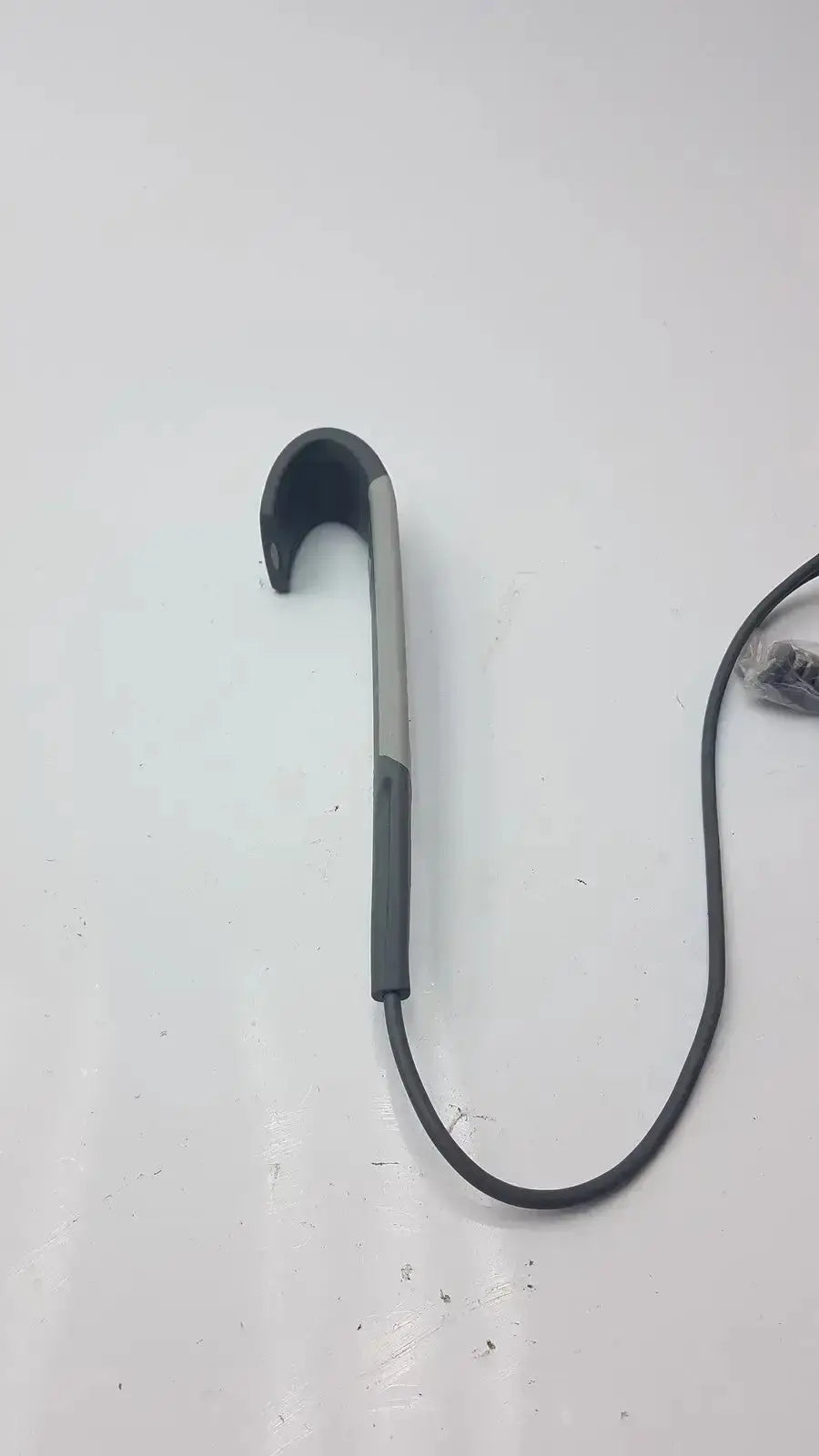 Black and silver phone stand with curved hook design for arjo huntleigh carendo shower hygiene chair remote