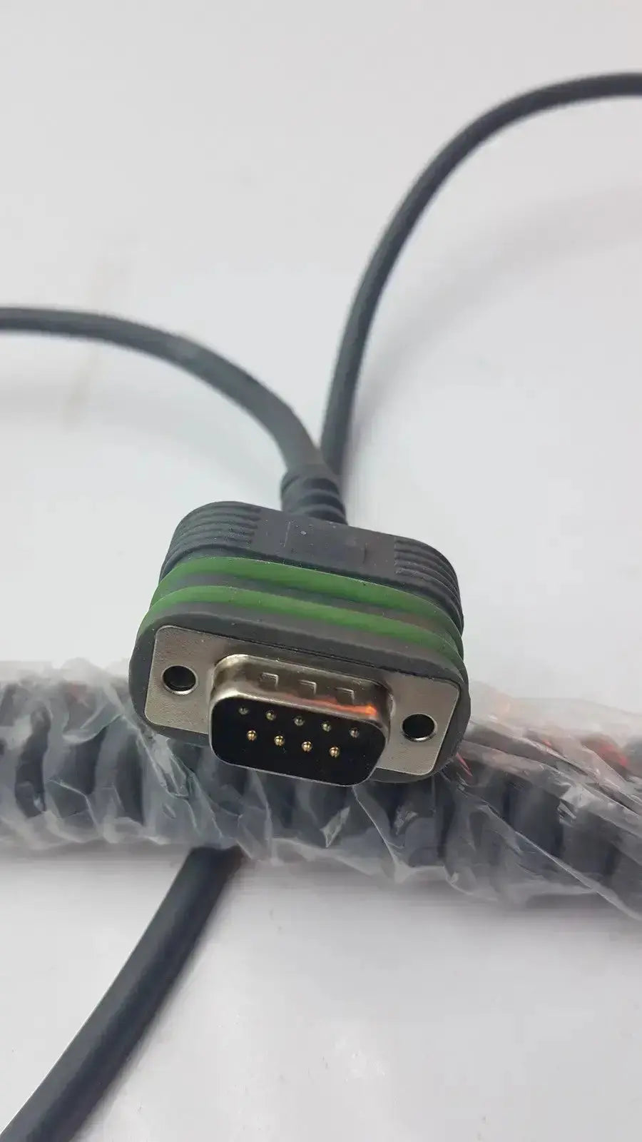 Black and green coiled cable with 9-pin d-sub connector for arjo huntleigh carendo shower hygiene chair remote