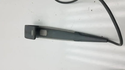 Black plastic car windshield wiper blade with curved handle and cord for arjo huntleigh patient lift wired remote handset controller