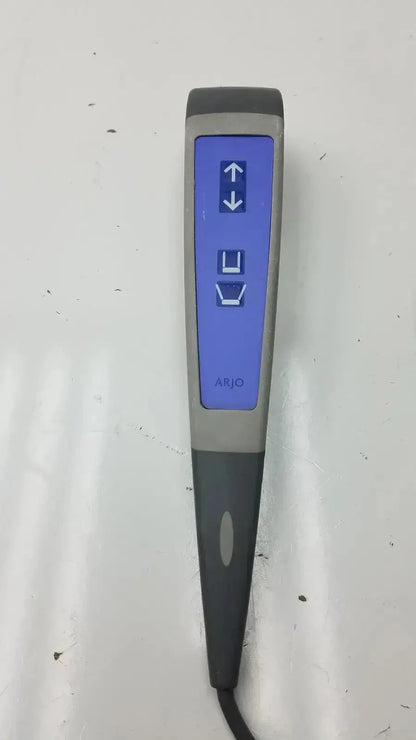 Gray and blue arjo huntleigh patient lift wired remote handset controller with digital display and directional arrows