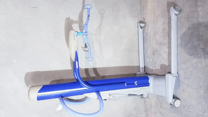 Blue and gray arjo maxi power patient lift with adjustable arms and wheels for safe patient transfer 700-19326