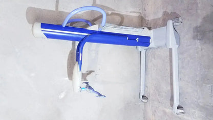 Arjo maxi power patient lift in blue and white with adjustable armrests and wheels for safe patient handling