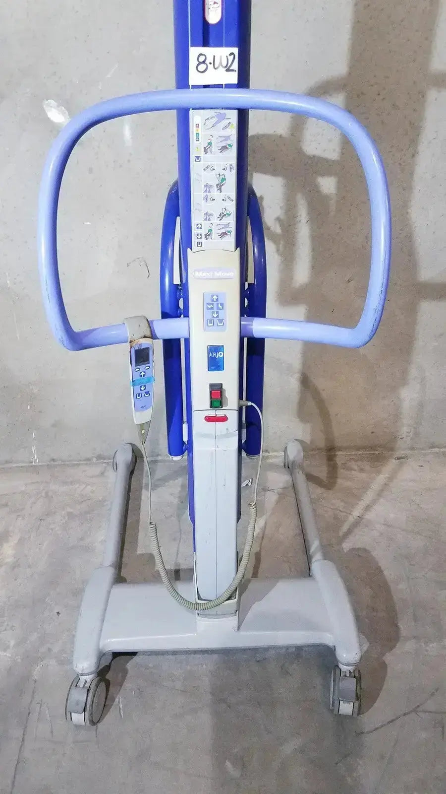 Blue and gray arjo maxi power patient lift with digital control panel handlebars and wheels for safe patient transfer