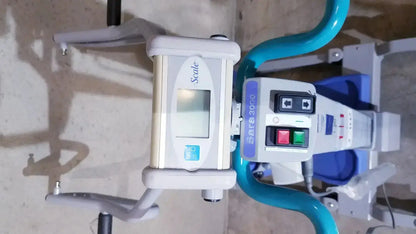 White and teal arjo sara 3000 hospital mobile patient lift with digital display for standing raising assistance