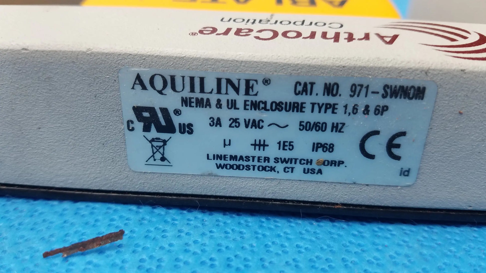 Aquiline industrial switch enclosure with white plastic housing and gray label for ArthroCare 10863 dual footswitch pedal in used medical equipment for sale