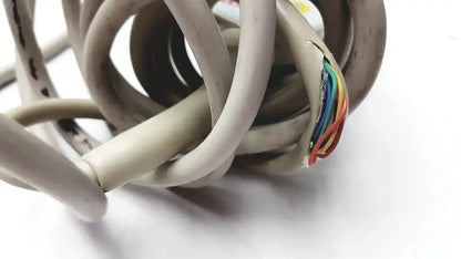 Tangled beige electrical cable with exposed rainbow-colored wires for ascom hc-pspkr-da-d2 patient response system