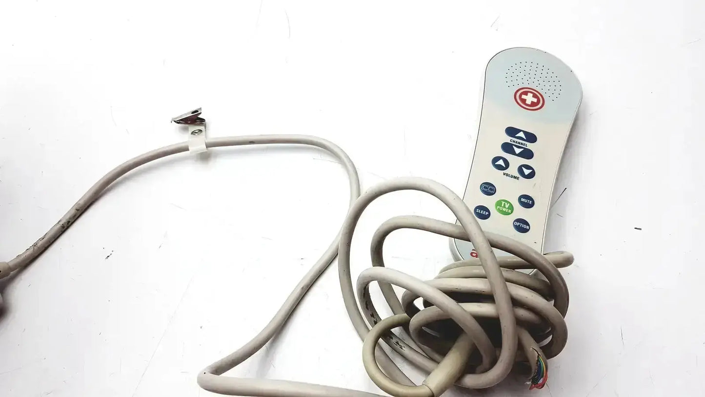 Gray plastic remote control with red cross and multiple buttons with coiled cable for hc-pspkr-da-d2 patient response system