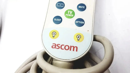 White plastic ascom hc-pspkr-da-d2 patient response remote control with blue green and yellow buttons g-cir-r6-21c
