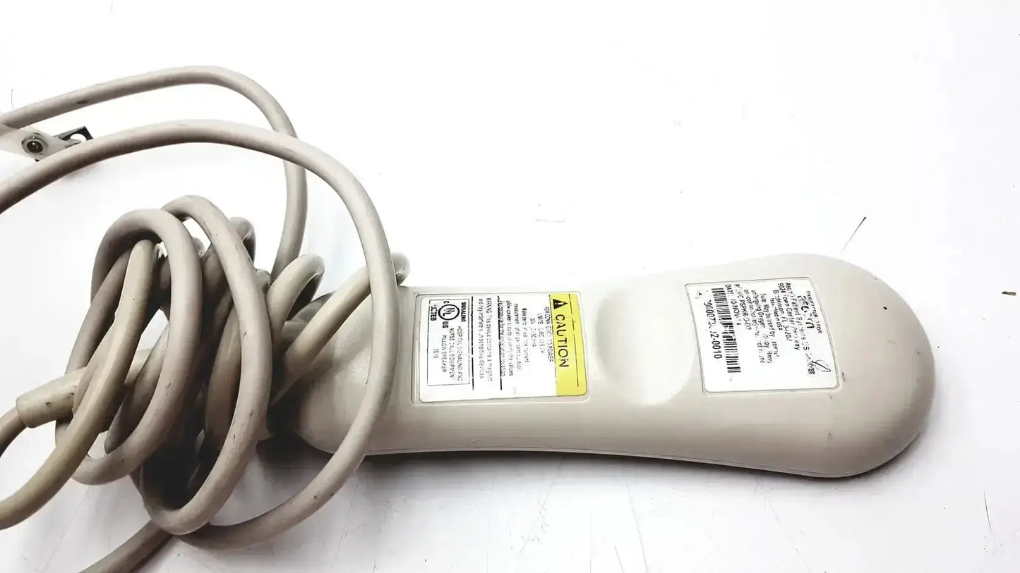 Beige plastic-handled electric hair dryer with coiled gray cord and warning labels for hc-pspkr-da-d2 patient response system