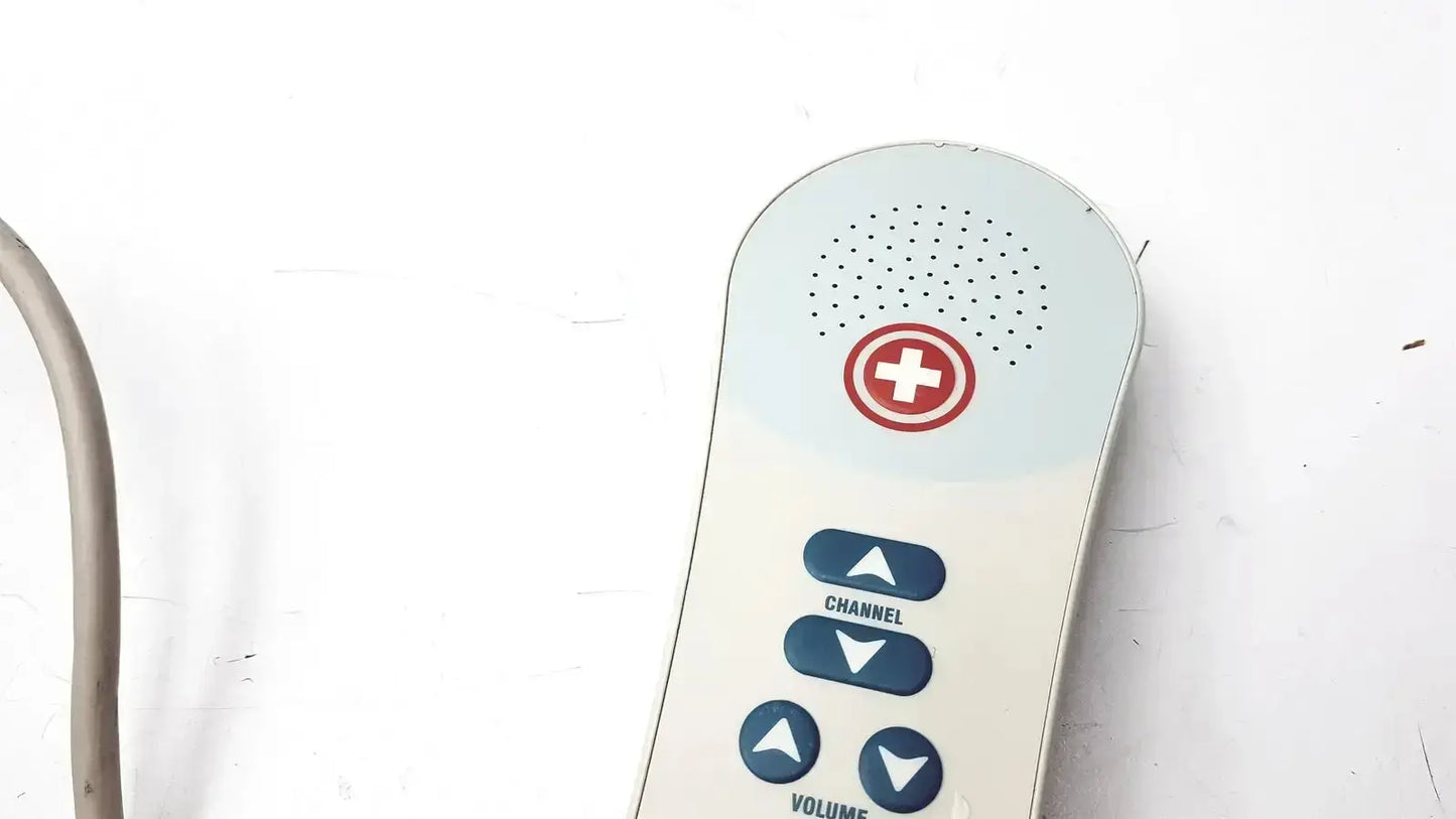 White and light blue Ascom hc-pspkr-da-d2 patient response medical alert remote with red cross and volume controls