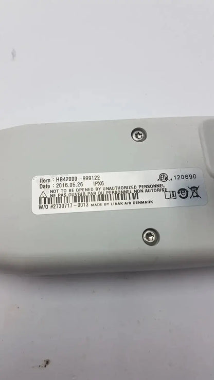Light gray plastic back side of atlas hb42000-999122 handset with white label showing ipx6 rating and date 2016.05.26