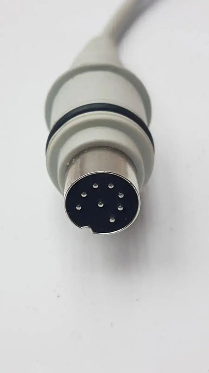 Gray and black 15-pin medical-grade connector with metallic housing on the back of atlas hb42000-999122 handset