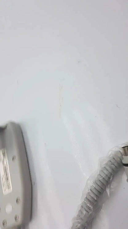Gray coiled telephone cord with matching gray handset base of atlas hb42000-999122 handset product image