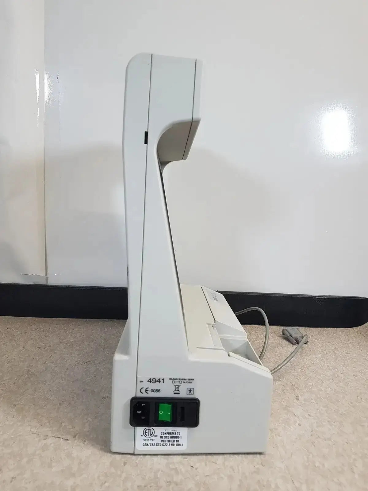 White plastic canon imageclass 4941 printer with green power button and black cord used with audioscan verifit vf-1 hearing aid analyzer