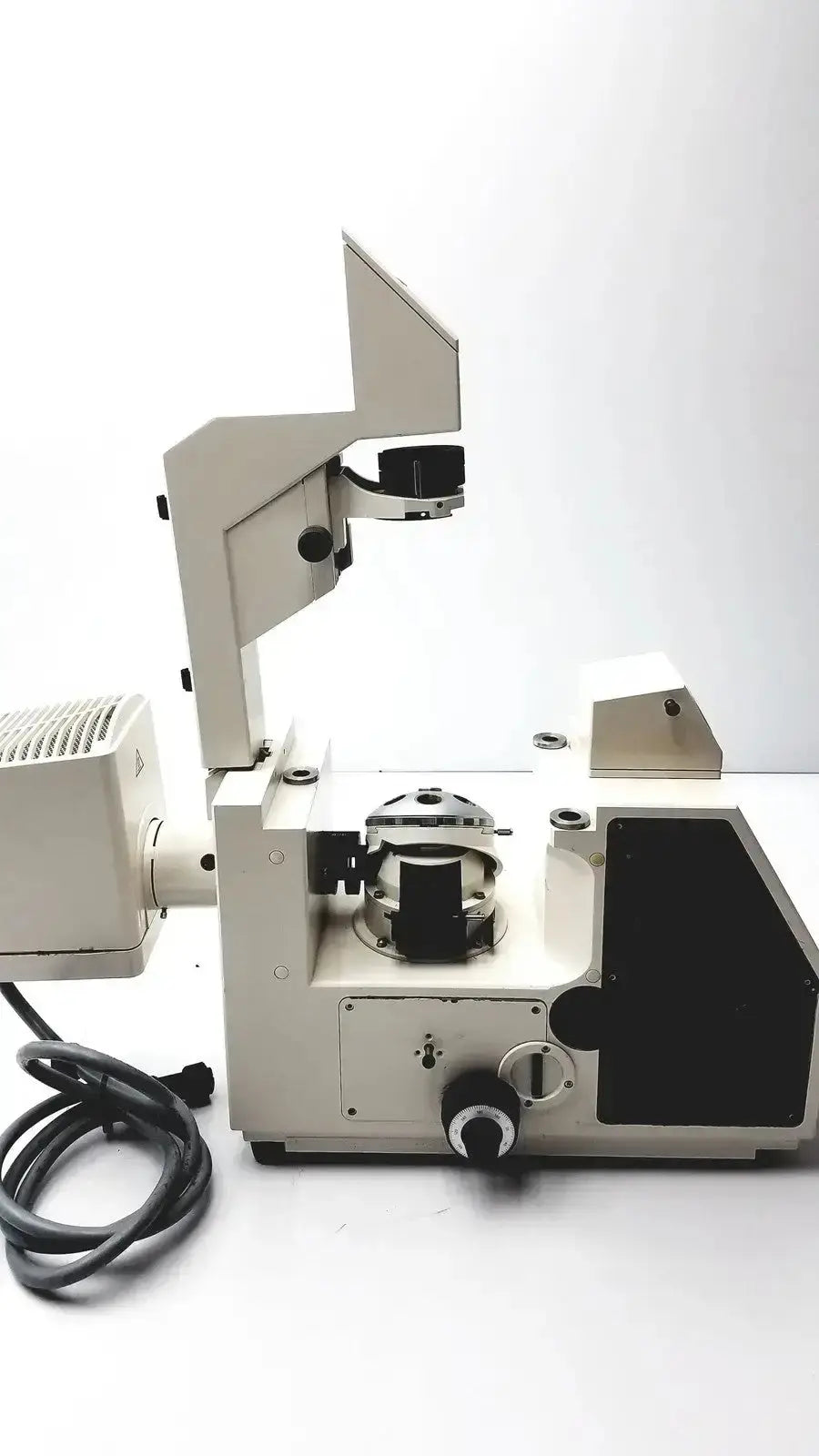 Beige metal axiovert 35 inverted phase contrast microscope with black accents and built-in light source