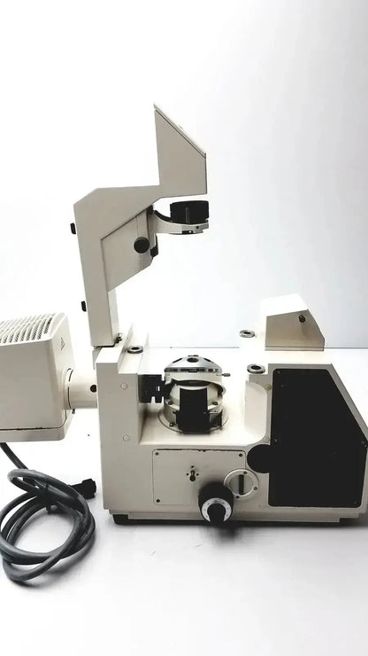 Beige metal axiovert 35 inverted phase contrast microscope with black accents and built-in light source